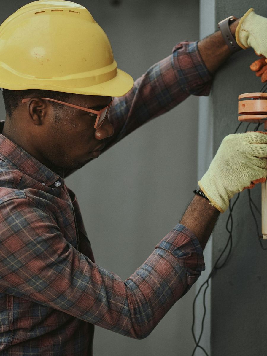 An ASSL engineer working on equipment in the field